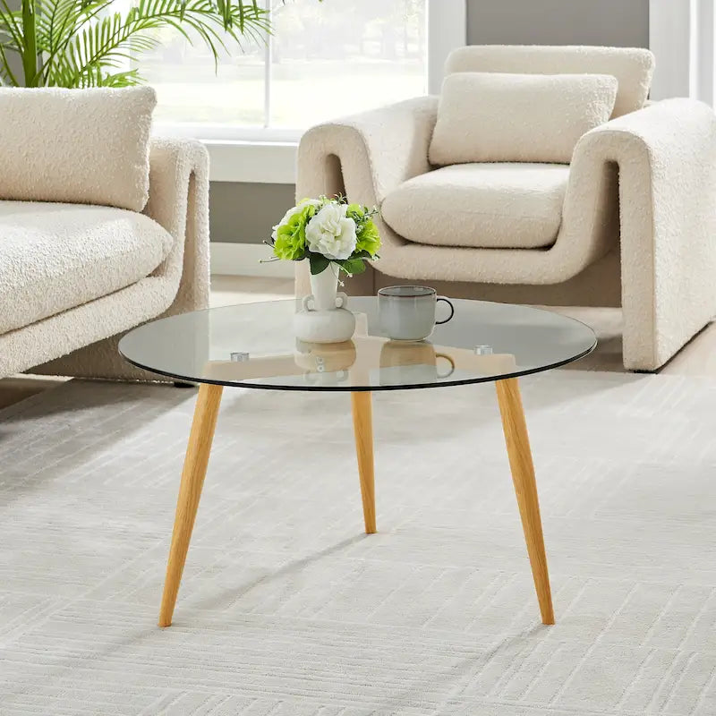 Table basse avec pieds effilés et plateau en verre
