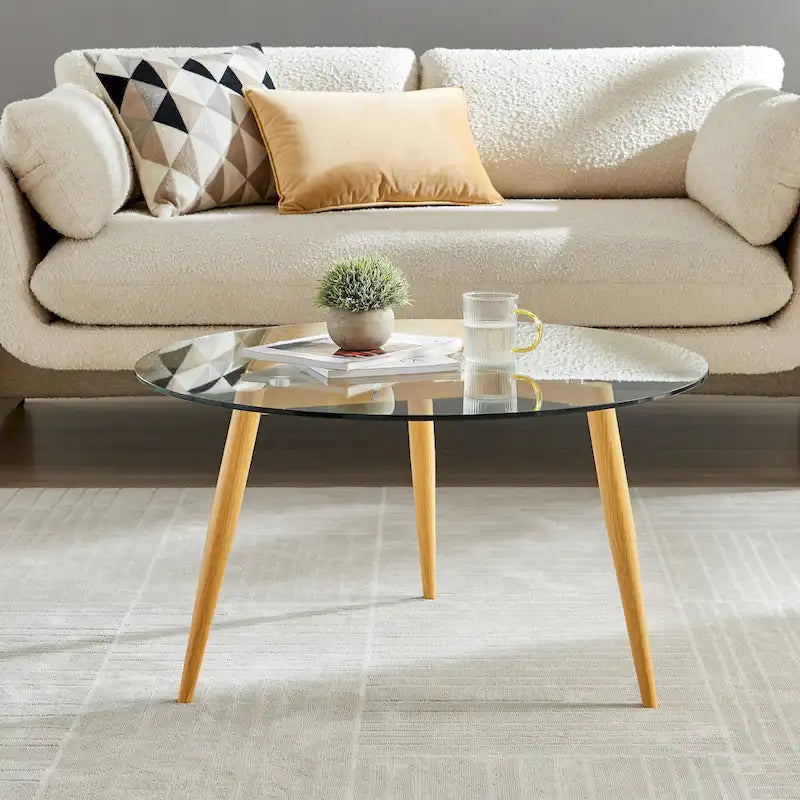 Table basse avec pieds effilés et plateau en verre