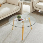 Table basse avec pieds effilés et plateau en verre